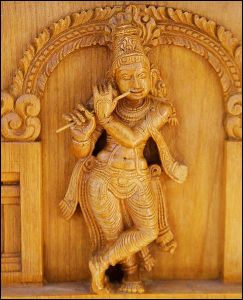 486px-Krishna_holding_flute