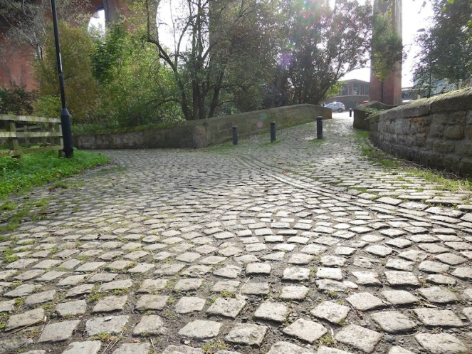 Cobble paths with lens flare