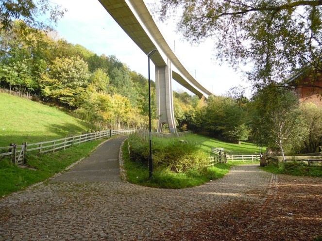 Metro bridge & leafy cobbles