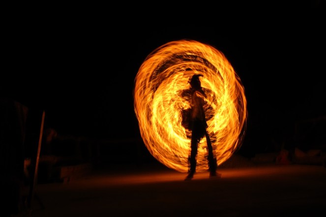 A performer twirls a flaming baton - Ko Lanta, November 2010
